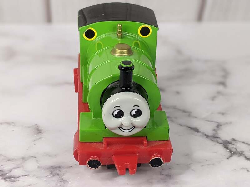 A green train engine of the character Henry from the Thomas & Friends television series.